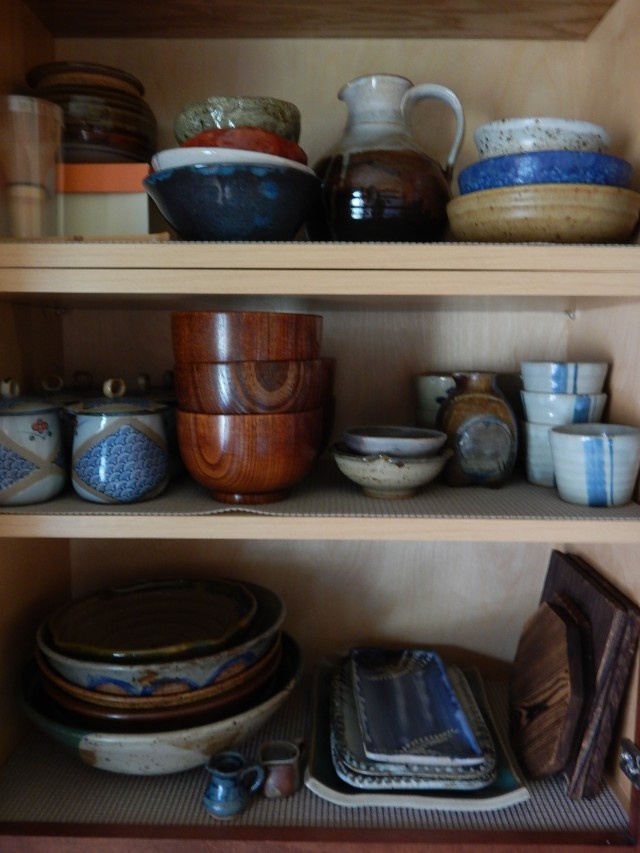 The main pottery cabinet (which also holds my lacquered wood soup bowls and wood trivets)