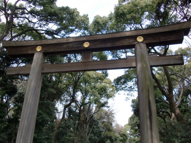 The huge torii gate at the entrance to the Meiji Shrine. Torii mark the entrance to sacred spaces.