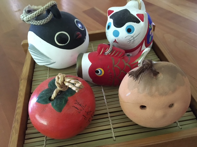 A fugu, Inu Hariko, koinobori, persimmon and clay face from Mashiko.