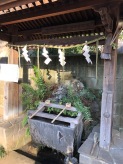 The purification fountain at Hisatomi-jinja